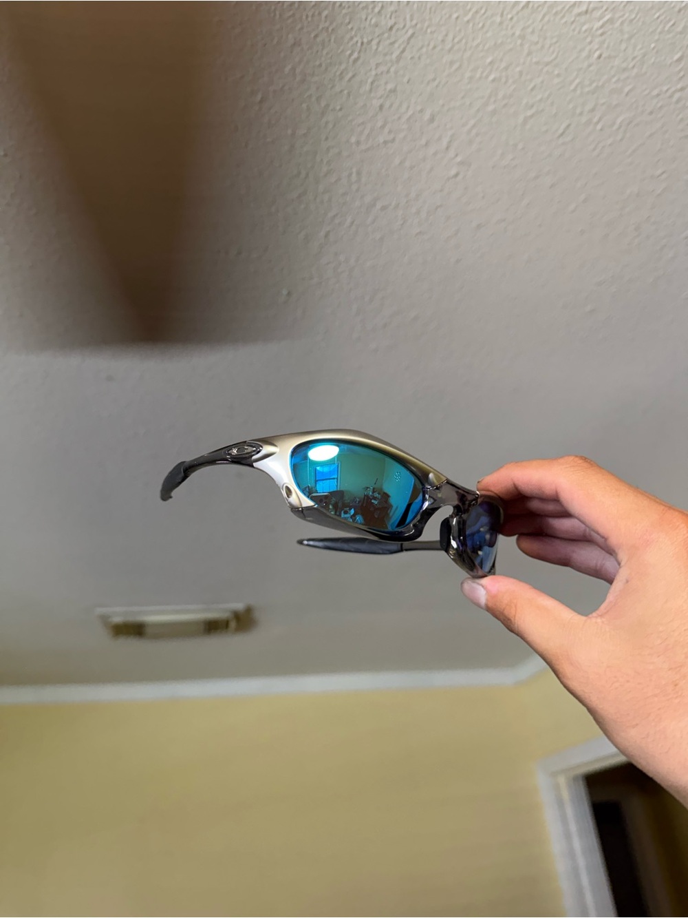 Silver Frame Sunglasses with Blue Mirrored Lenses Oakley
